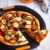 Le Creuset Antihaft Pizza-Backblech, Ø 33 cm, Belüftungslöcher, PFOA-frei, Sauerteigbeständig, Aus Karbonstahl gefertigt, Anthrazit/Orange - 6